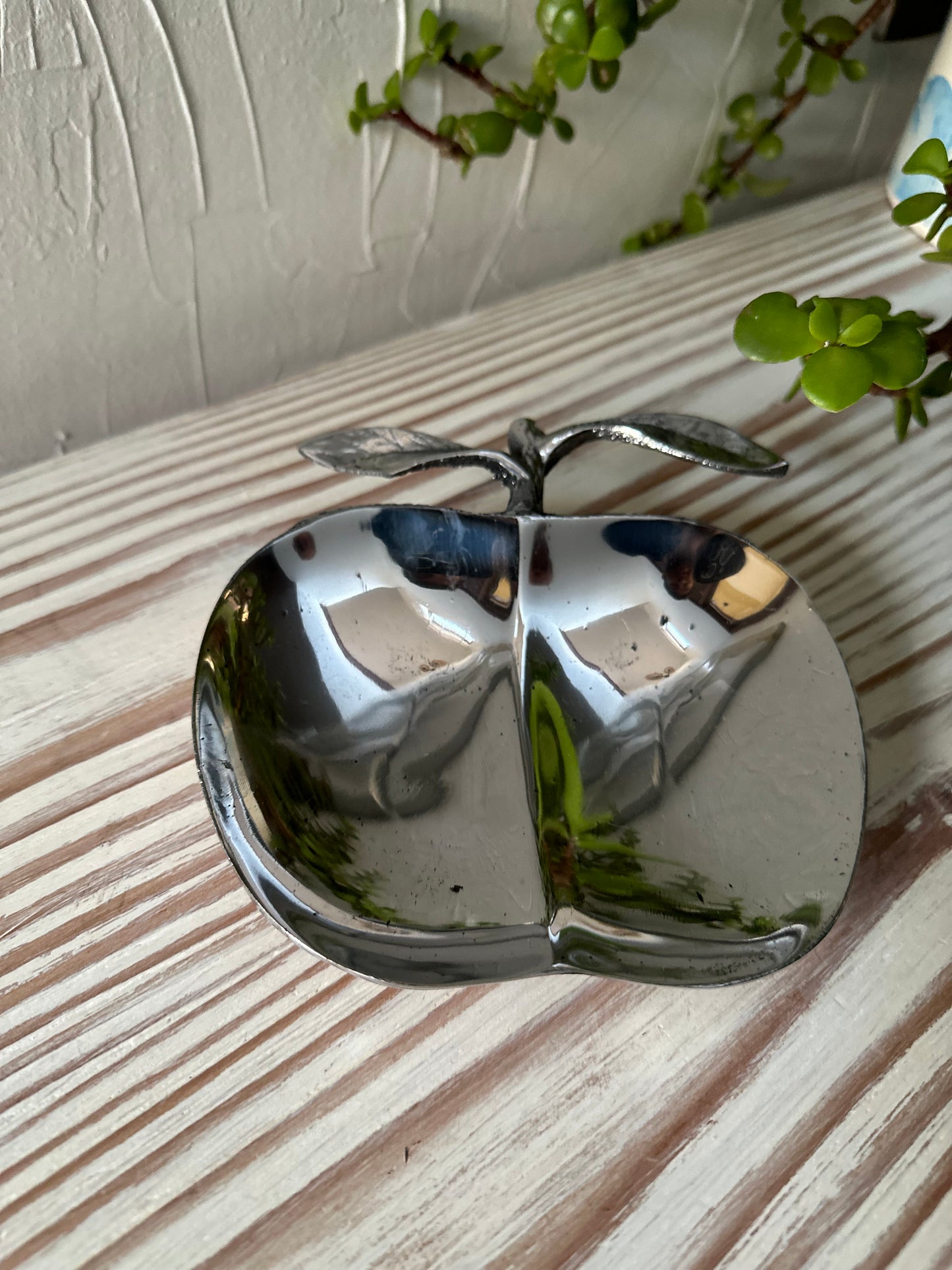 Manzana hojas Peltre